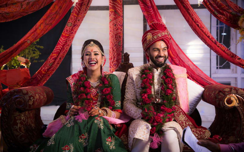 Editorial Vermilion wedding website theme — Aarav & Ananya at Curzon Hall