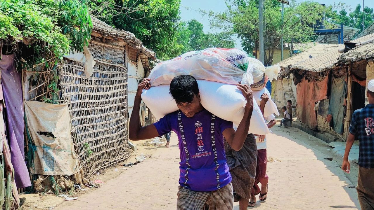 Bangladesh Shares Rice Harvest with Rohingya Refugees as Aid Shortages Deepen