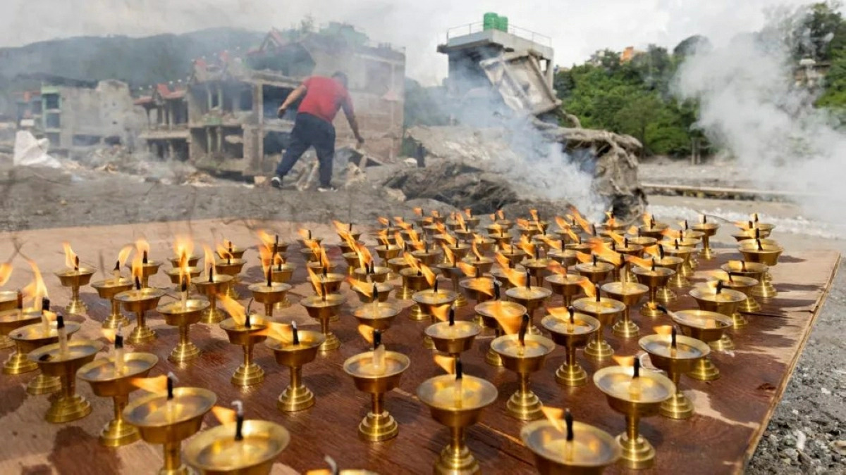 Nepal observes day of mourning for more than 1,300 killed in flood
