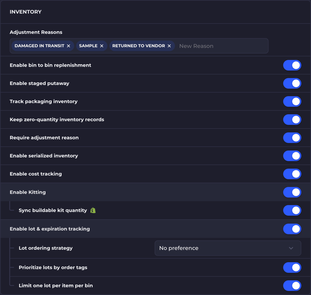 The Inventory section of the company settings page. It shows the Adjustment Reasons list, toggles for bin to bin replenishment, staged putaway, packaging, zero-quantity records, adjustment reasons, serialized inventory and cost tracking, and the Enable Kitting and Enable lot & expiration tracking groups with their child settings.