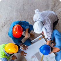 Professionals looking at blueprint