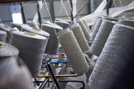 Cones of thread in bulk ready for weaving