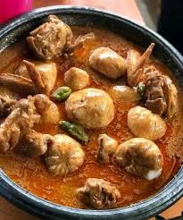 Banku And Groundnut Soup With Fish And Goat Meat