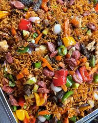 Assorted Jollof Rice With Big Tilapia