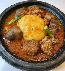 Fufu Light Soup With Fish And Goat Meat