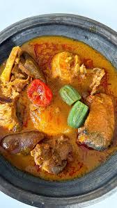 Banku And Palmnut Soup With Goat Meat