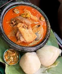 Banku And Palmnut Soup With Chicken And Fish