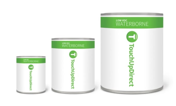 Three sizes of paint cans