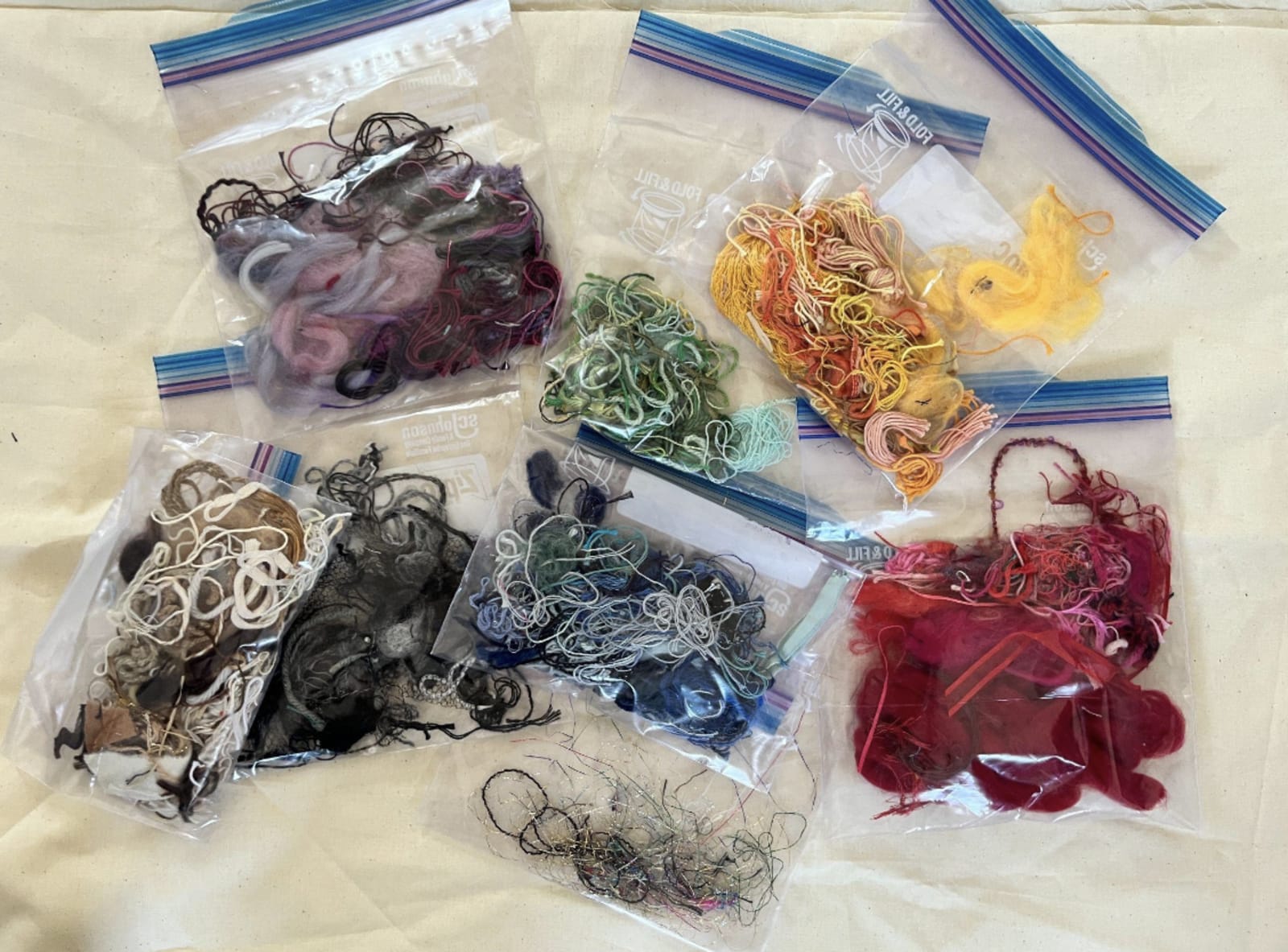 Scraps organized by color before weaving