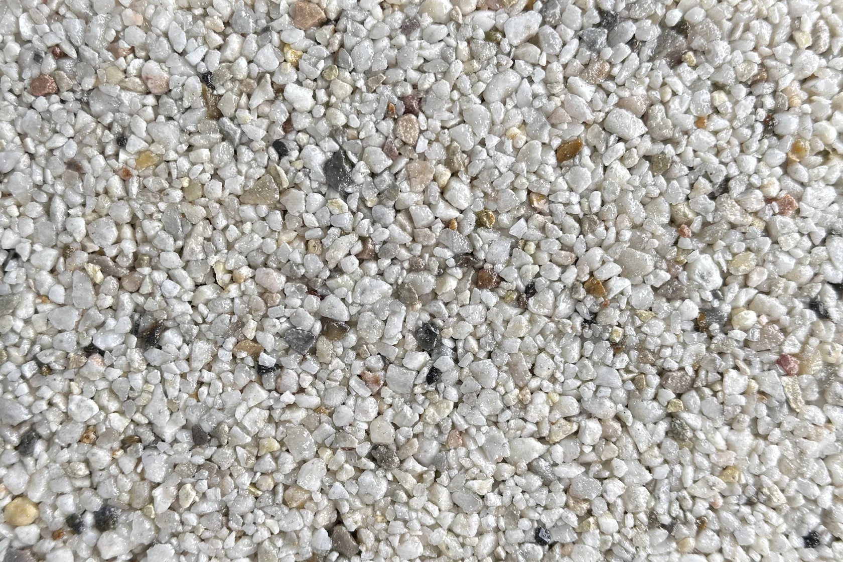 A close-up view of Alaskan Tundra blend stone overlay texture, suitable for flooring applications.