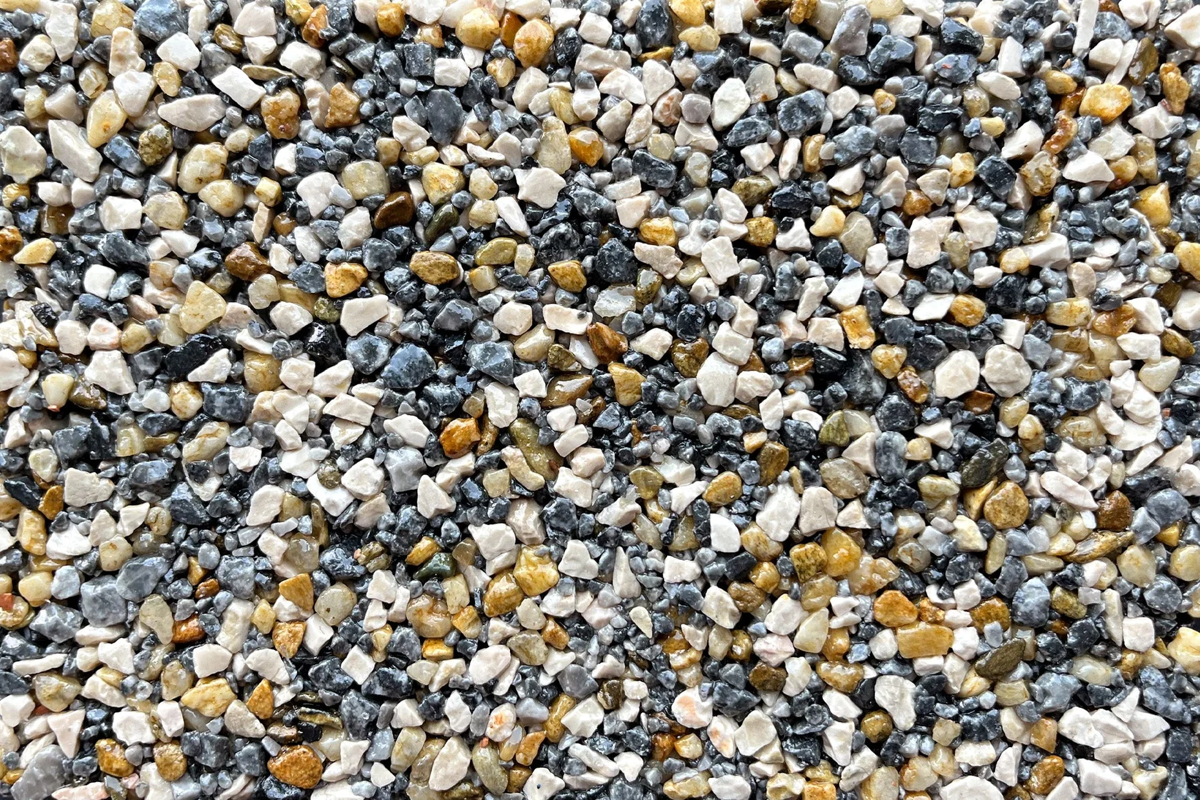 A close-up view of big sur vuba stone aggregate.