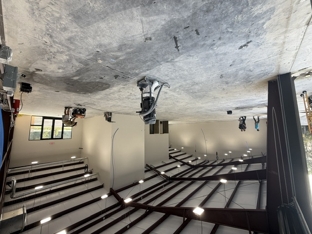 A commercial flooring preparation area in progress, showcasing equipment and an expansive space in South Carolina.