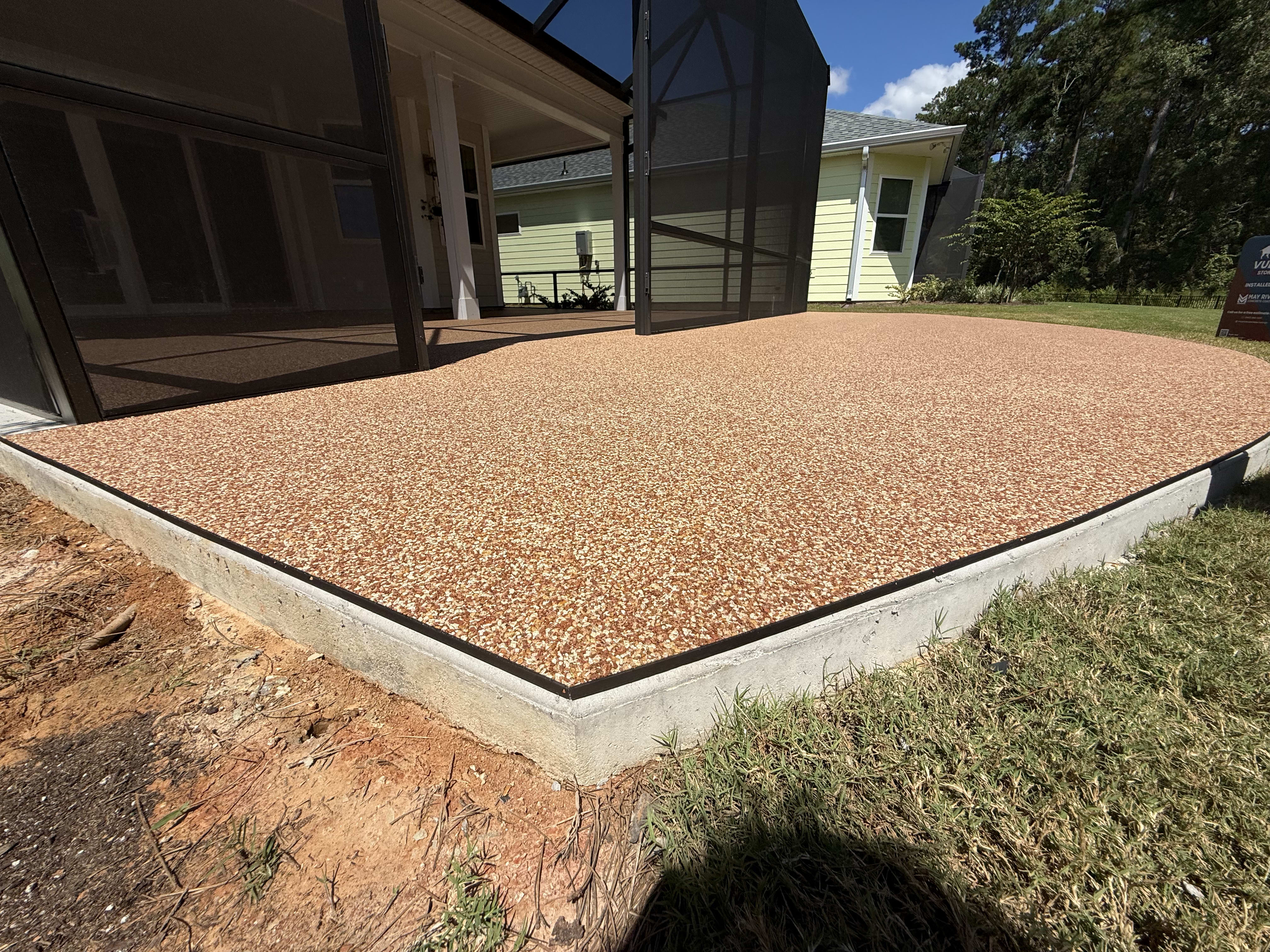 A spacious screen porch featuring comfortable seating and a protected outdoor area.
