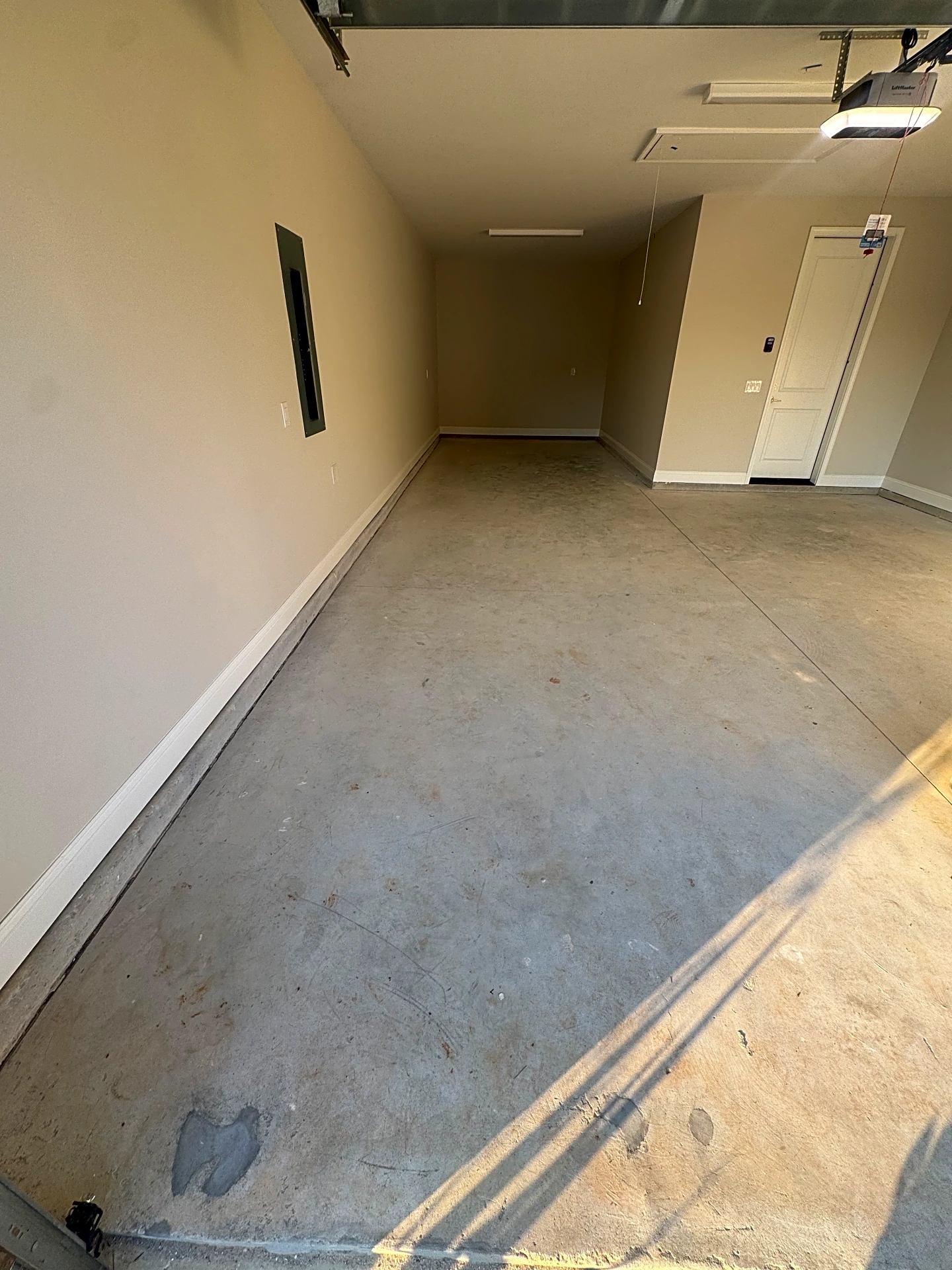 Bare concrete garage floor before coating in Hardeeville, SC.