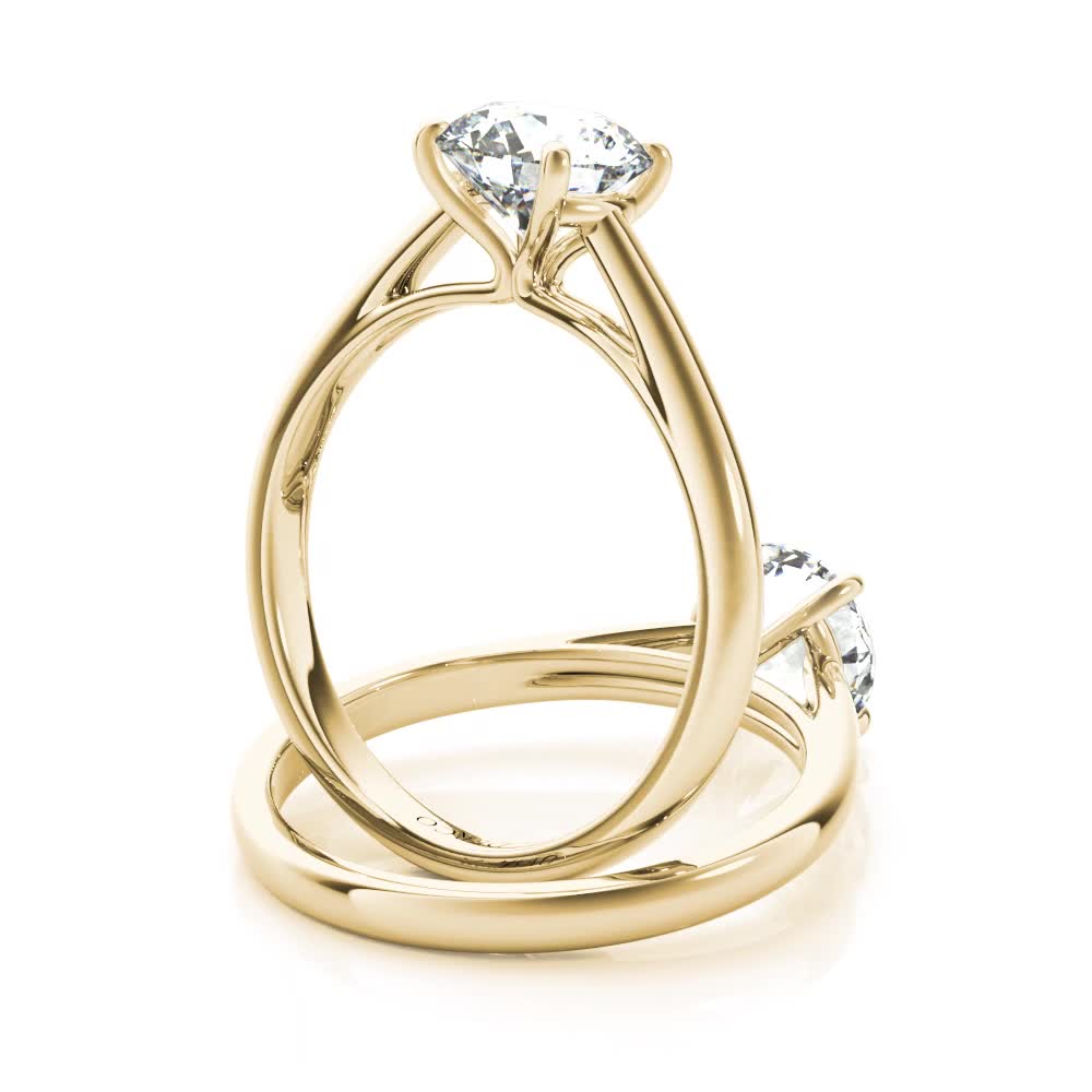 18k yellow gold cathedral solitaire engagement ring with round shape diamond