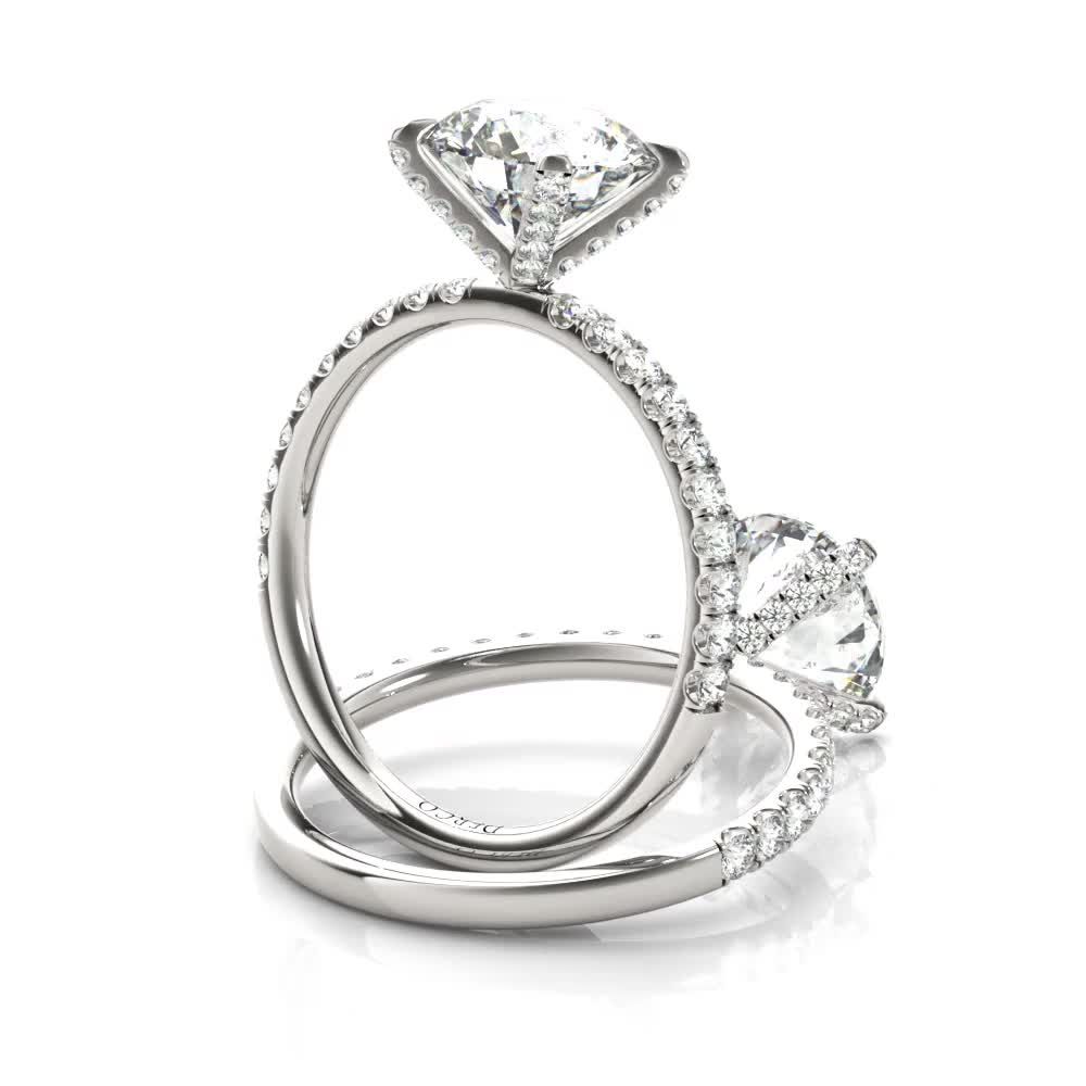 platinum diamond prong engagement ring with round shape diamond