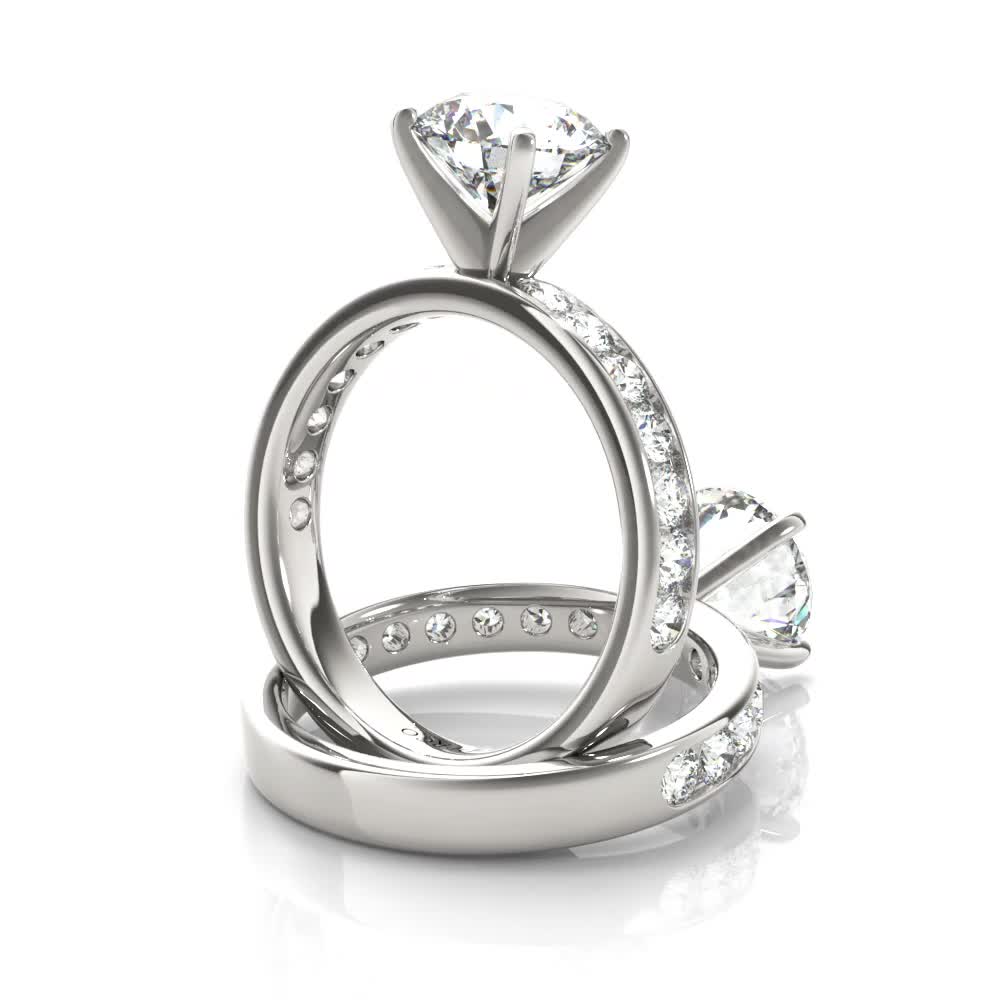 14k white gold channel set engagement ring with round shape diamond