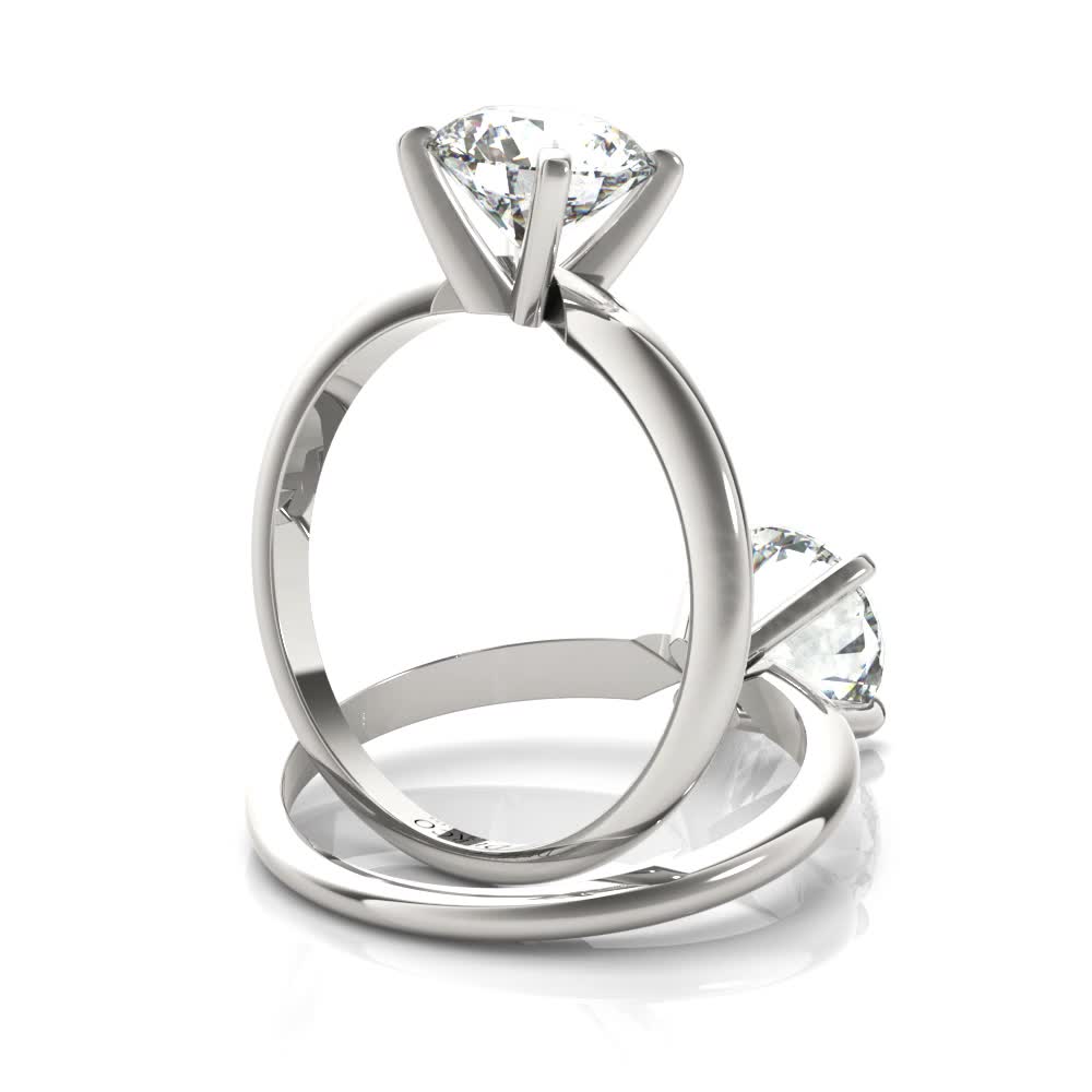 platinum solitaire 4 prong engagement ring with round shape diamond