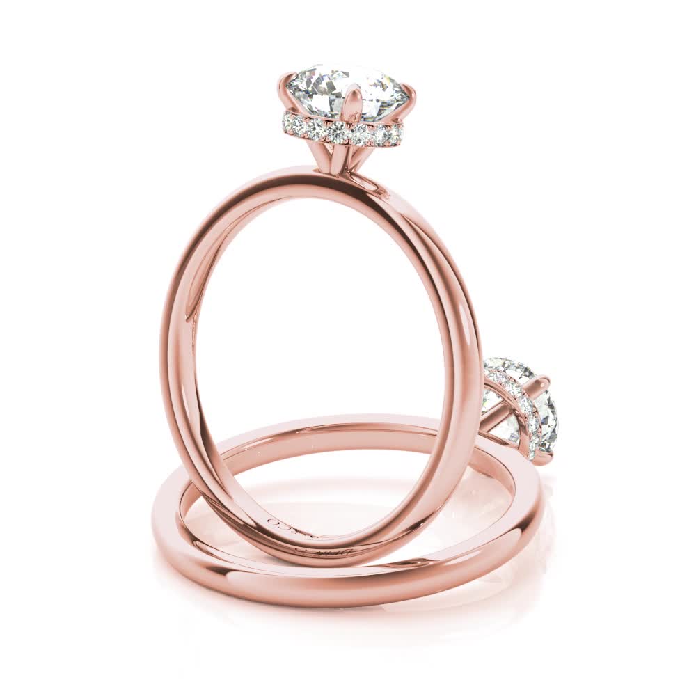 14k rose gold solitaire hidden halo engagement ring with round shape diamond