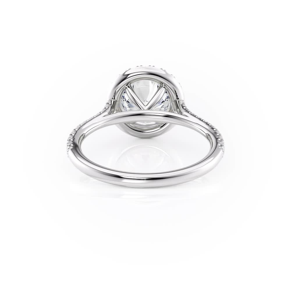 platinum petite halo engagement ring with round shape diamond