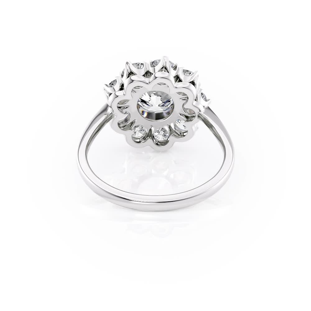 platinum starburst floral diamond halo engagement ring with round shape diamond