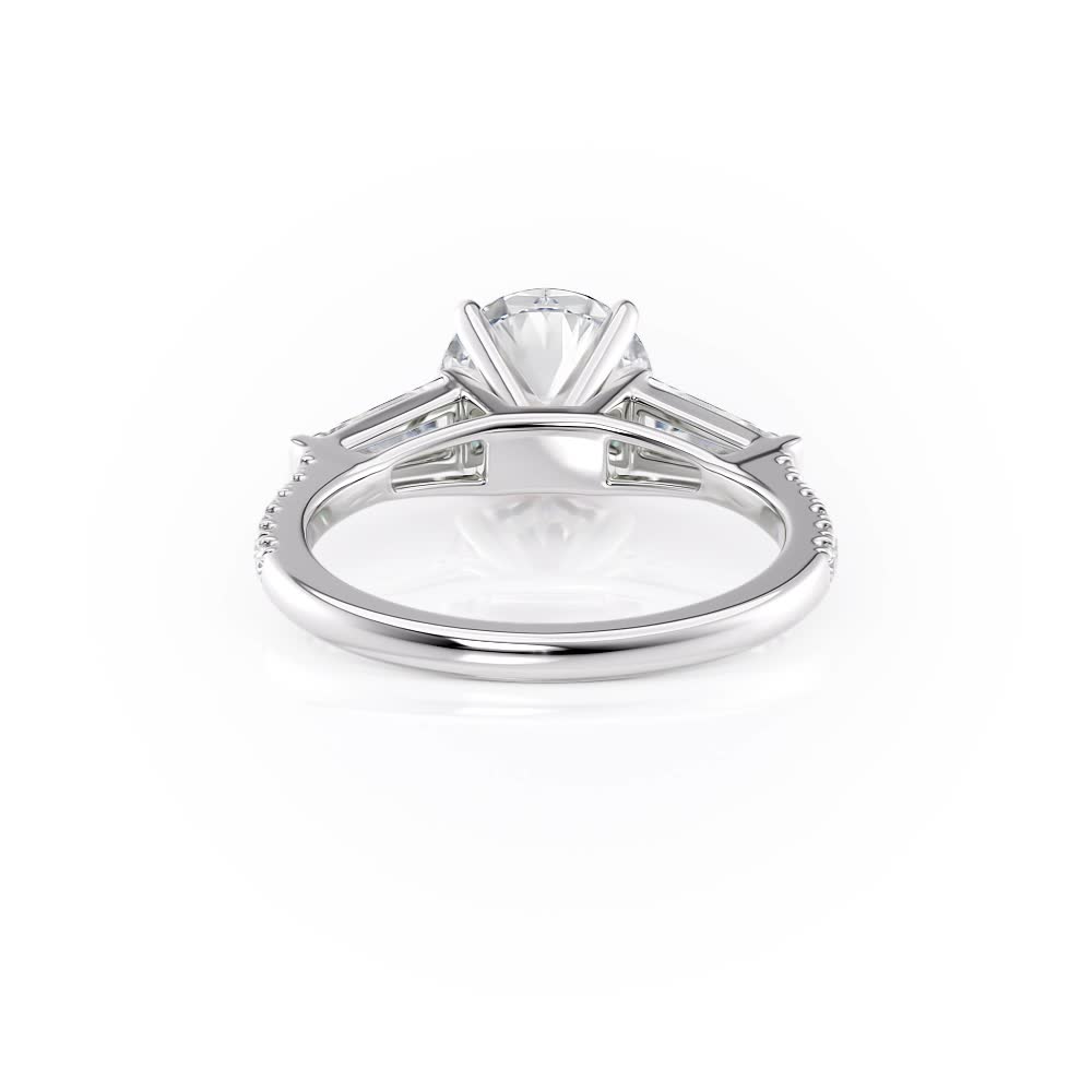platinum baguette and pave engagement ring with round shape diamond