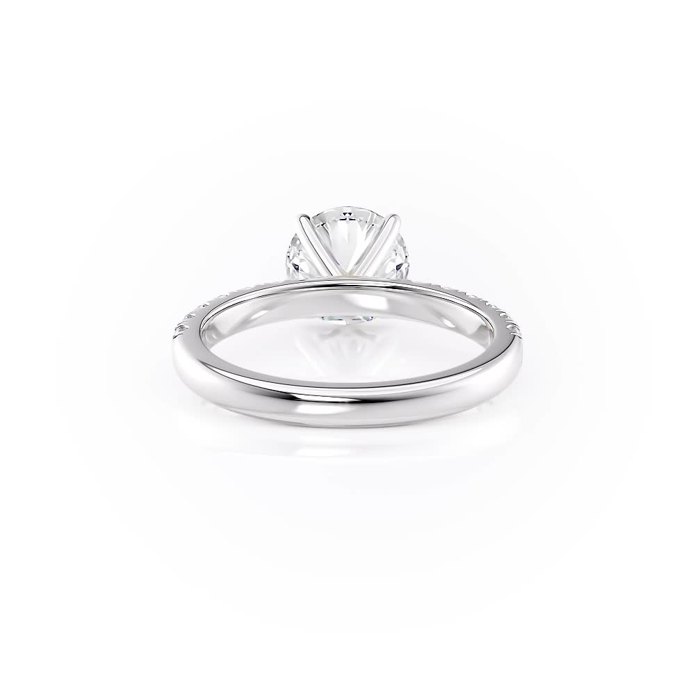 platinum scalloped pave engagement ring with round shape diamond
