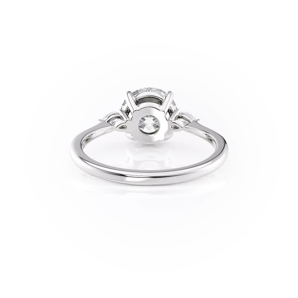 platinum three stone pear diamond engagement with round shape diamond