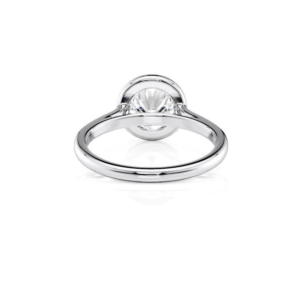 14k white gold round bezel solitaire with round shape diamond