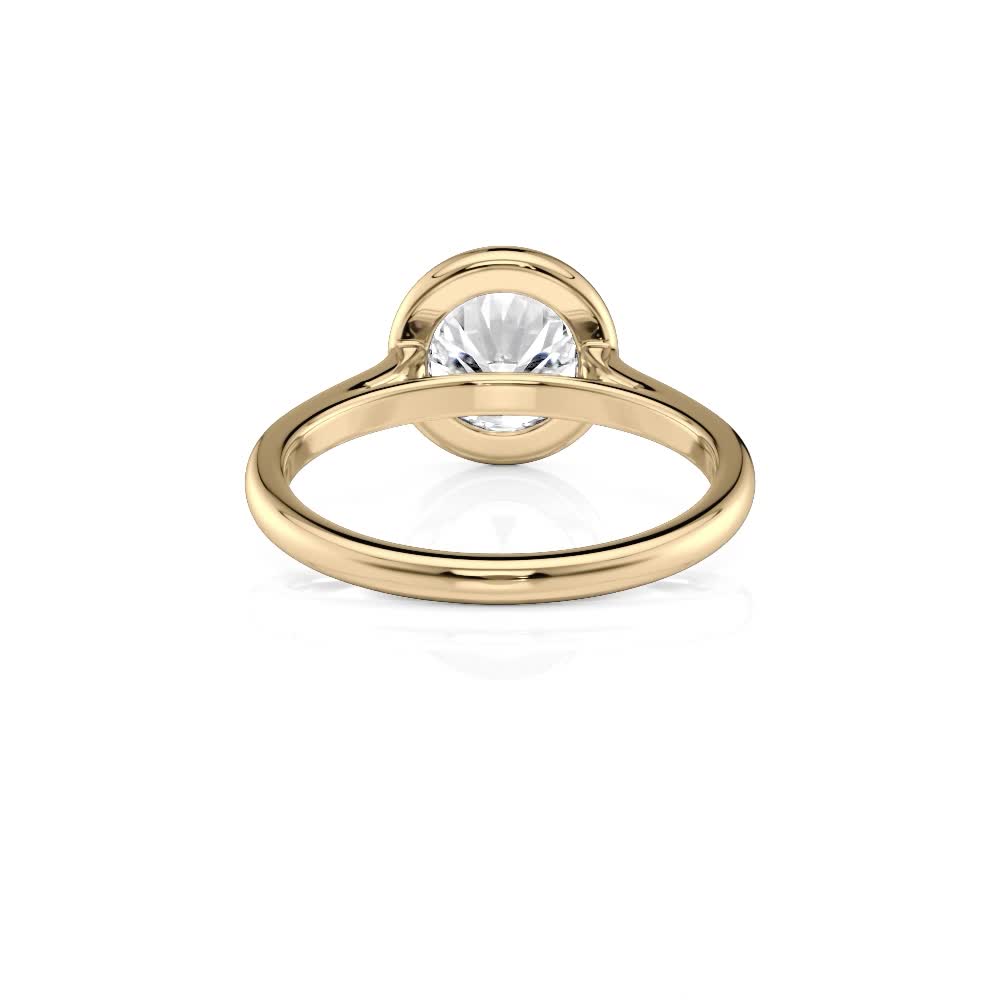 18k yellow gold round bezel solitaire with round shape diamond
