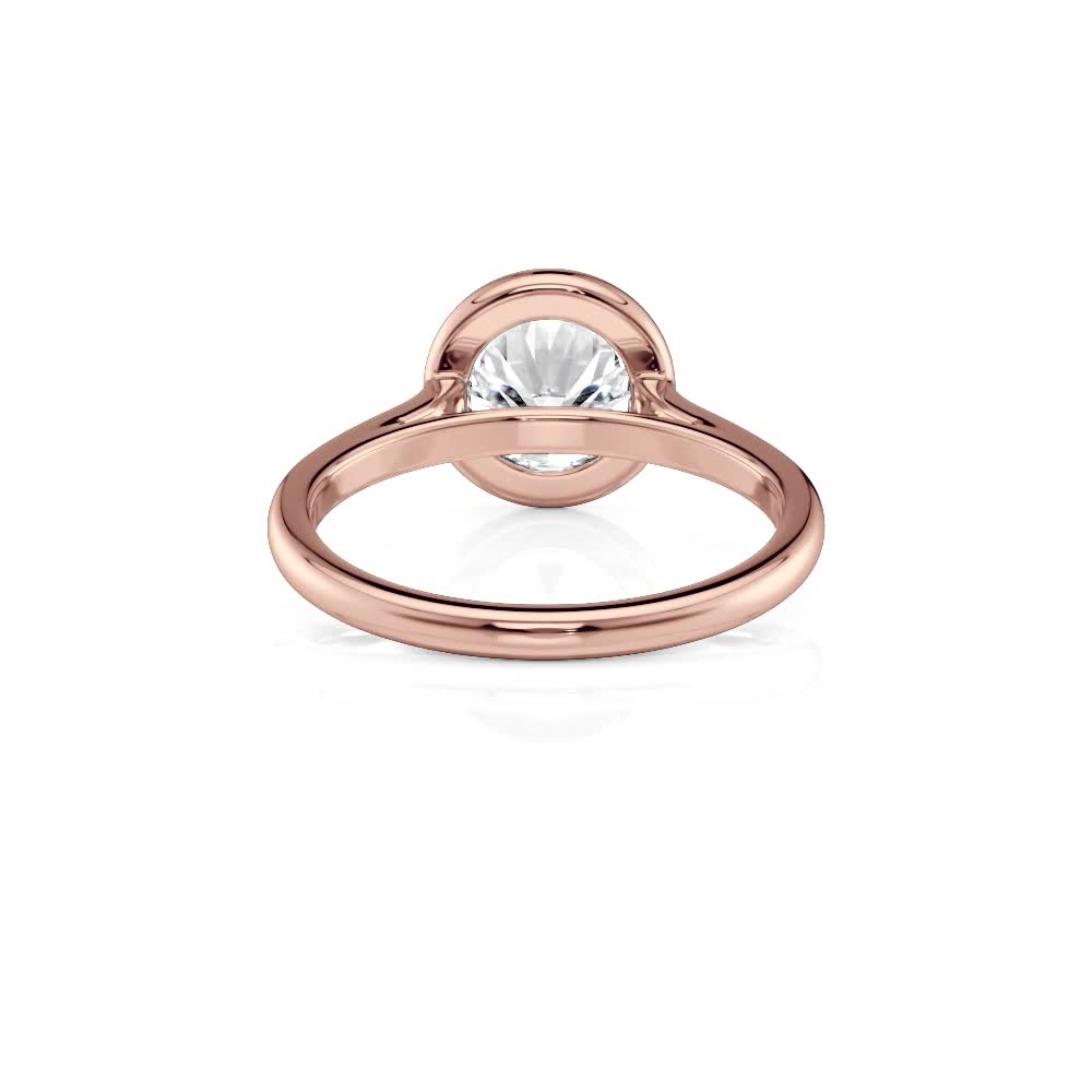 14k rose gold round bezel solitaire with round shape diamond