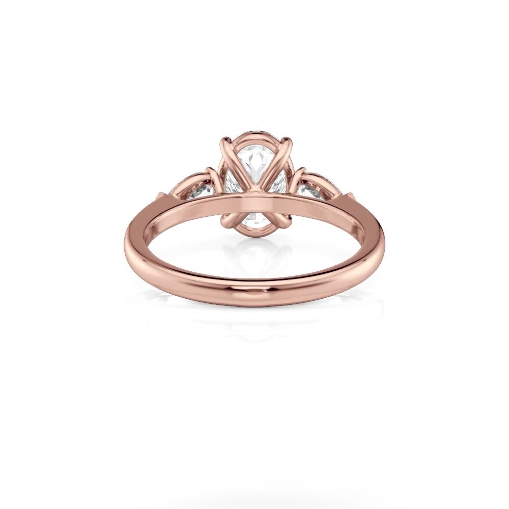 14k rose gold three stone pear lab diamonds flush fit engagement ring (0.50 ctw) with oval shape diamond