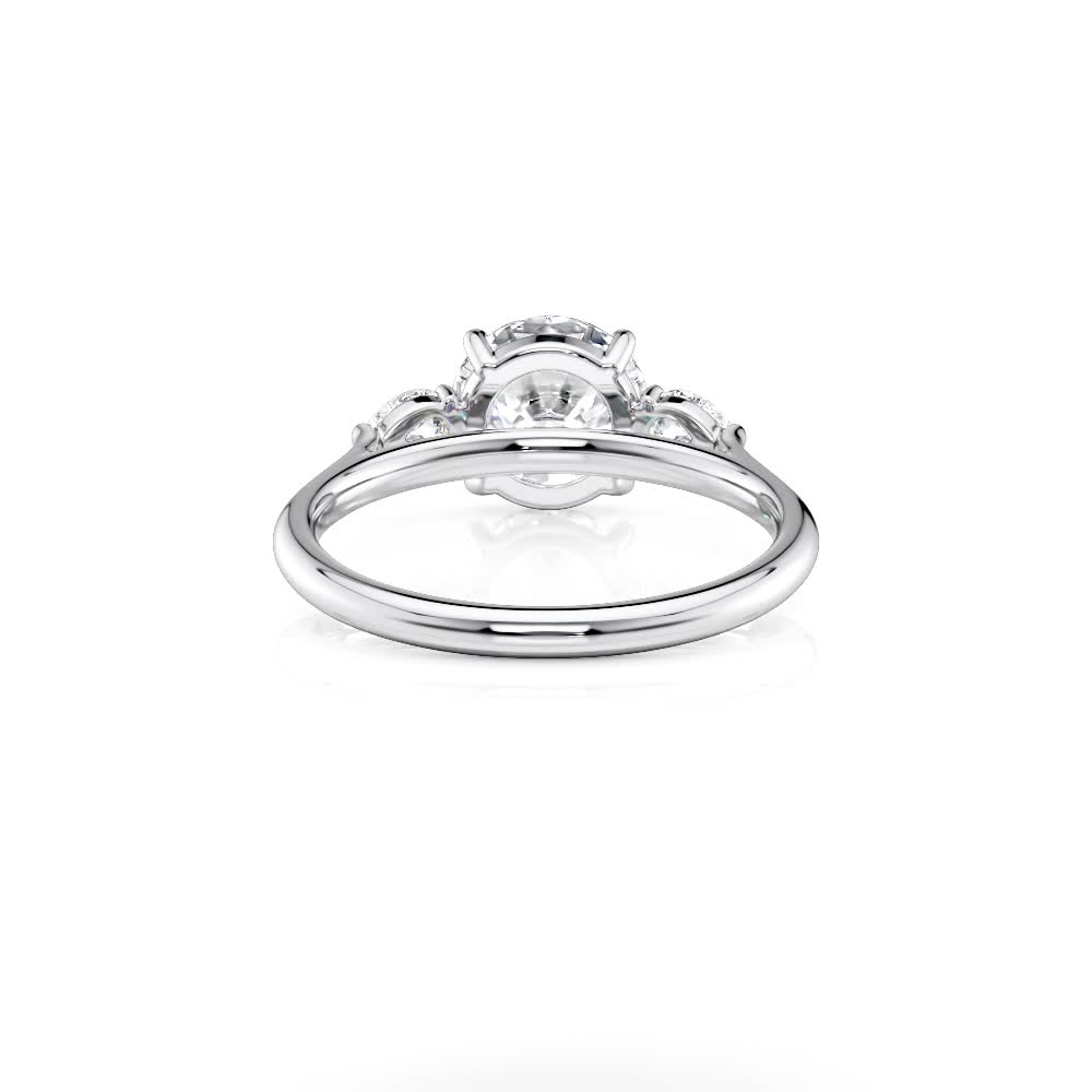 platinum lab round and pear flush fit three stone with round shape diamond