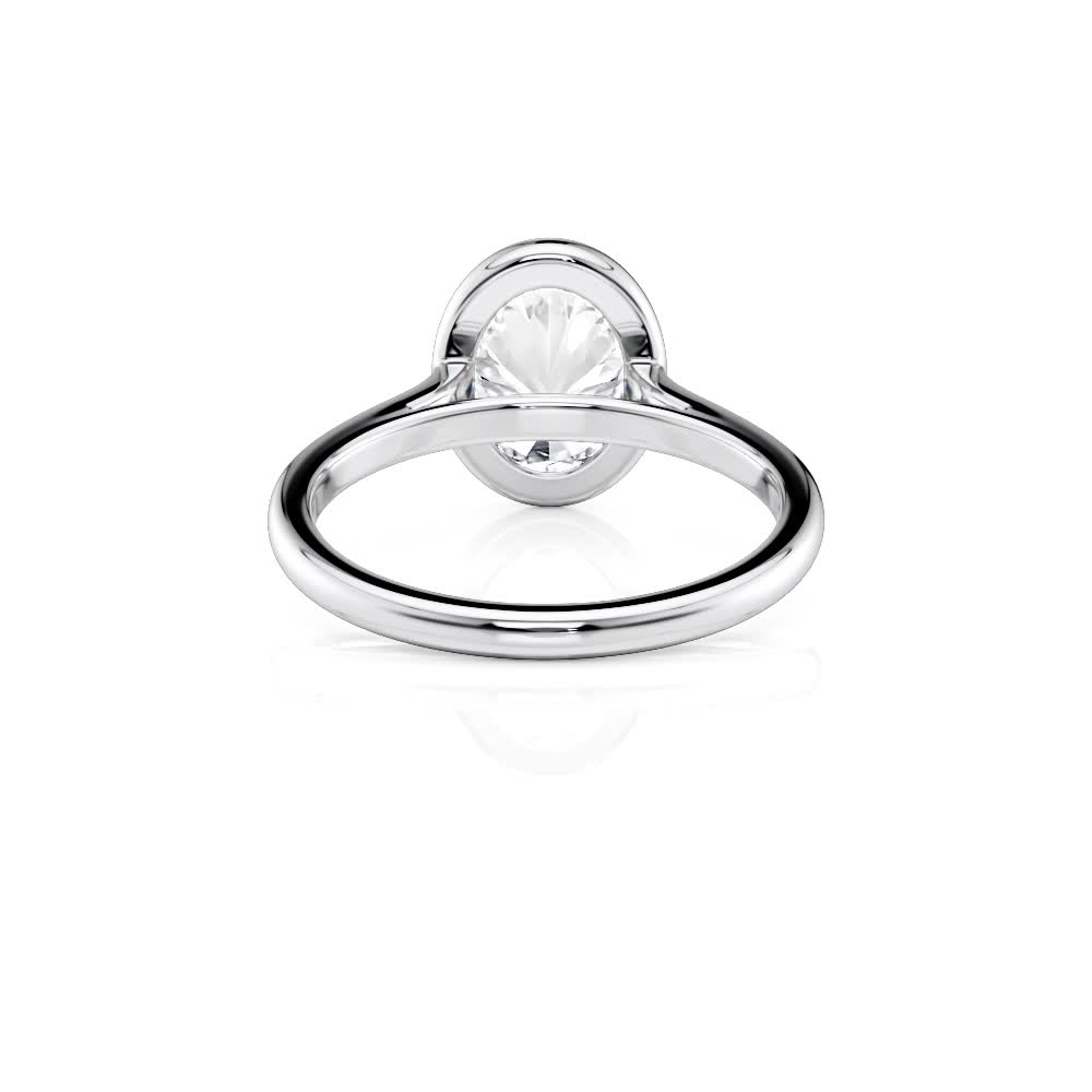 18k white gold oval bezel solitaire with oval shape diamond
