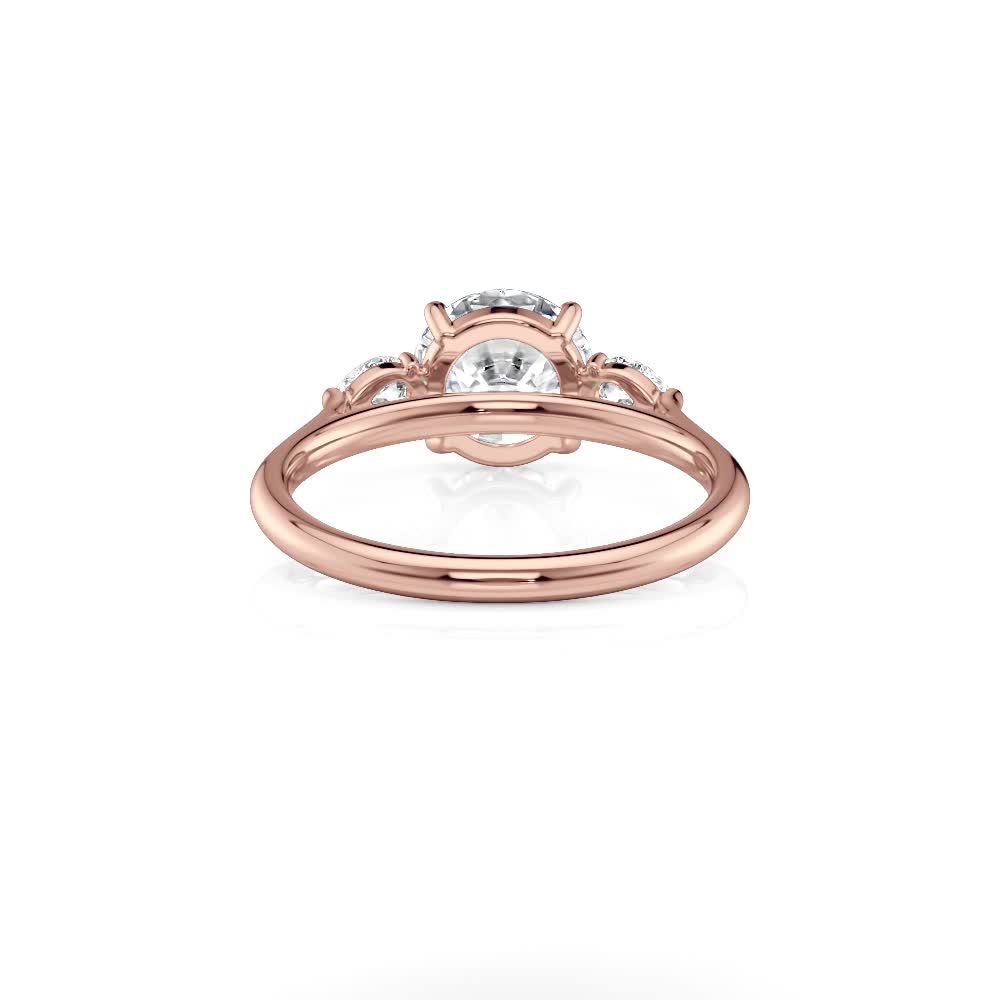 14k rose gold lab round and pear flush fit three stone with round shape diamond