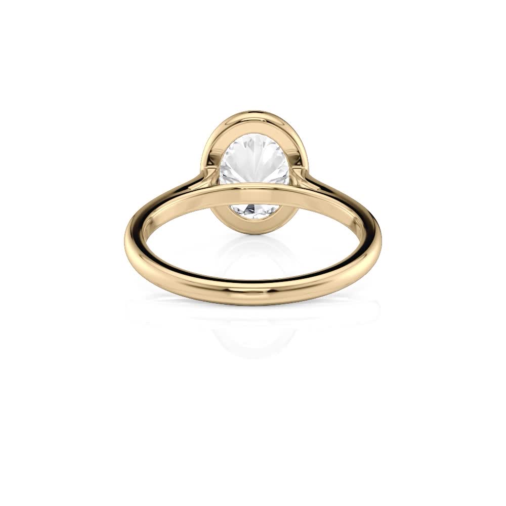 18k yellow gold oval bezel solitaire with oval shape diamond