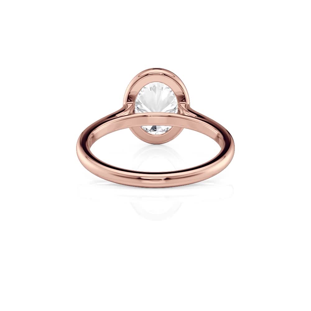 14k rose gold oval bezel solitaire with oval shape diamond