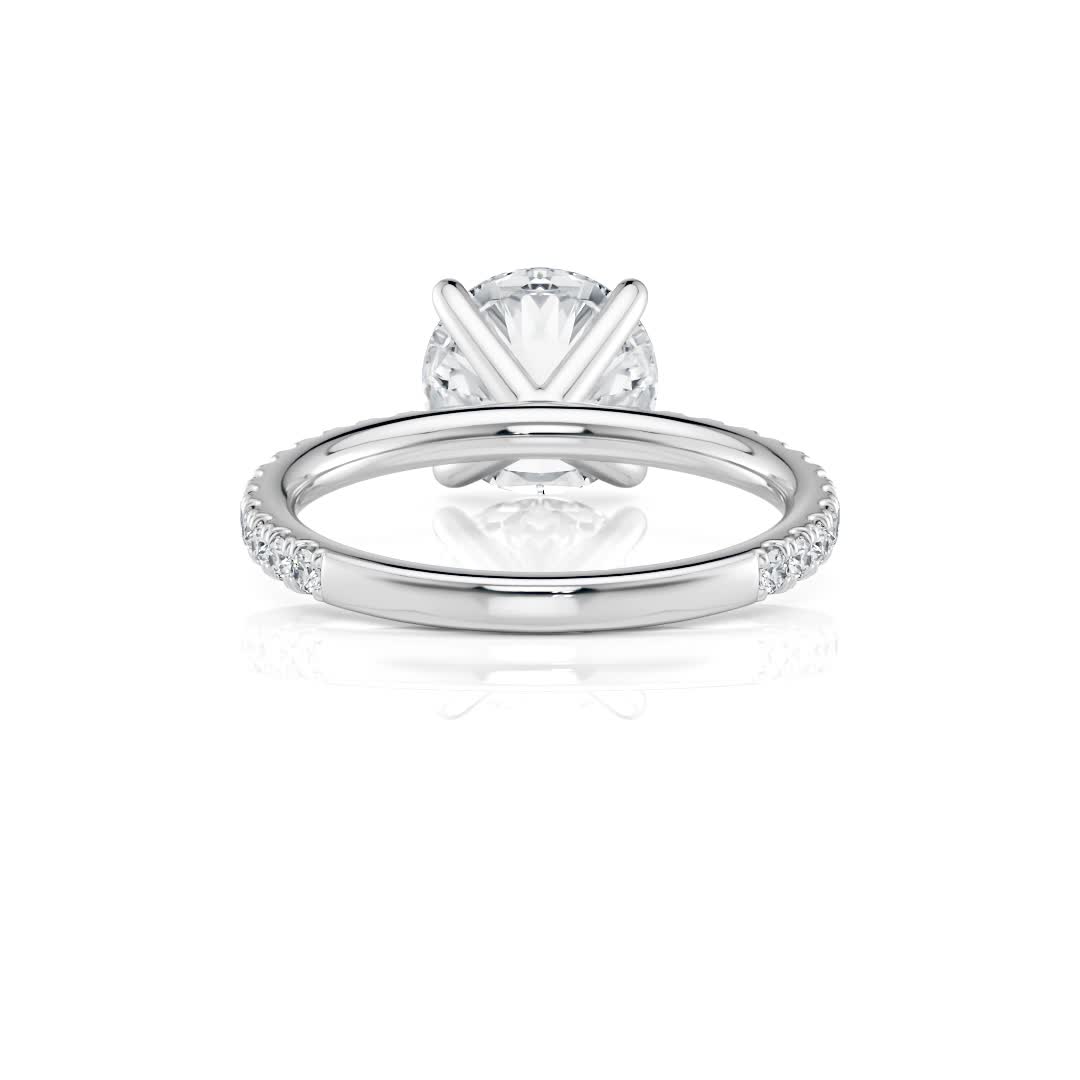 platinum natural floating v prong engagement ring with round shape diamond