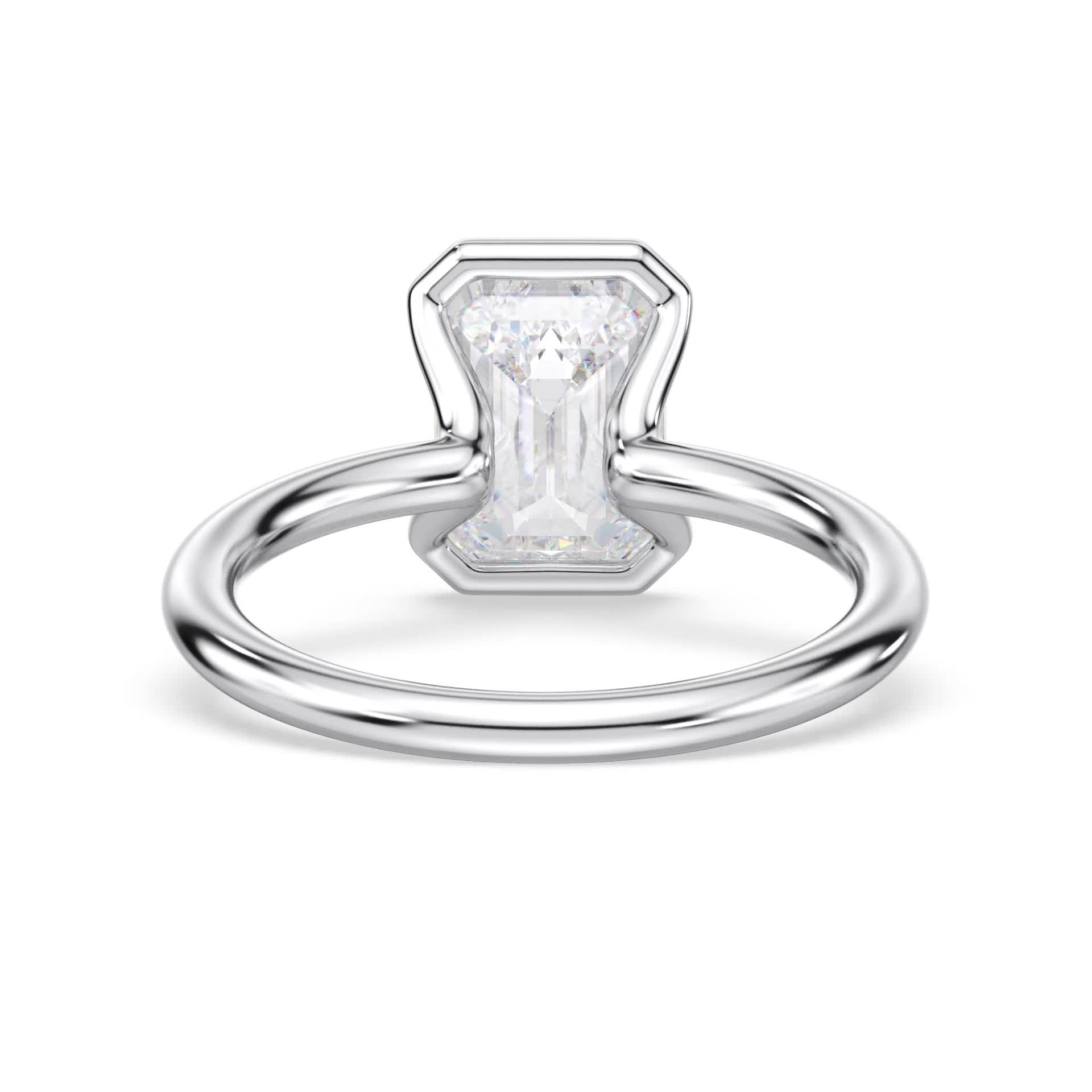 platinum half bezel emerald solitaire engagement ring with emerald shape diamond