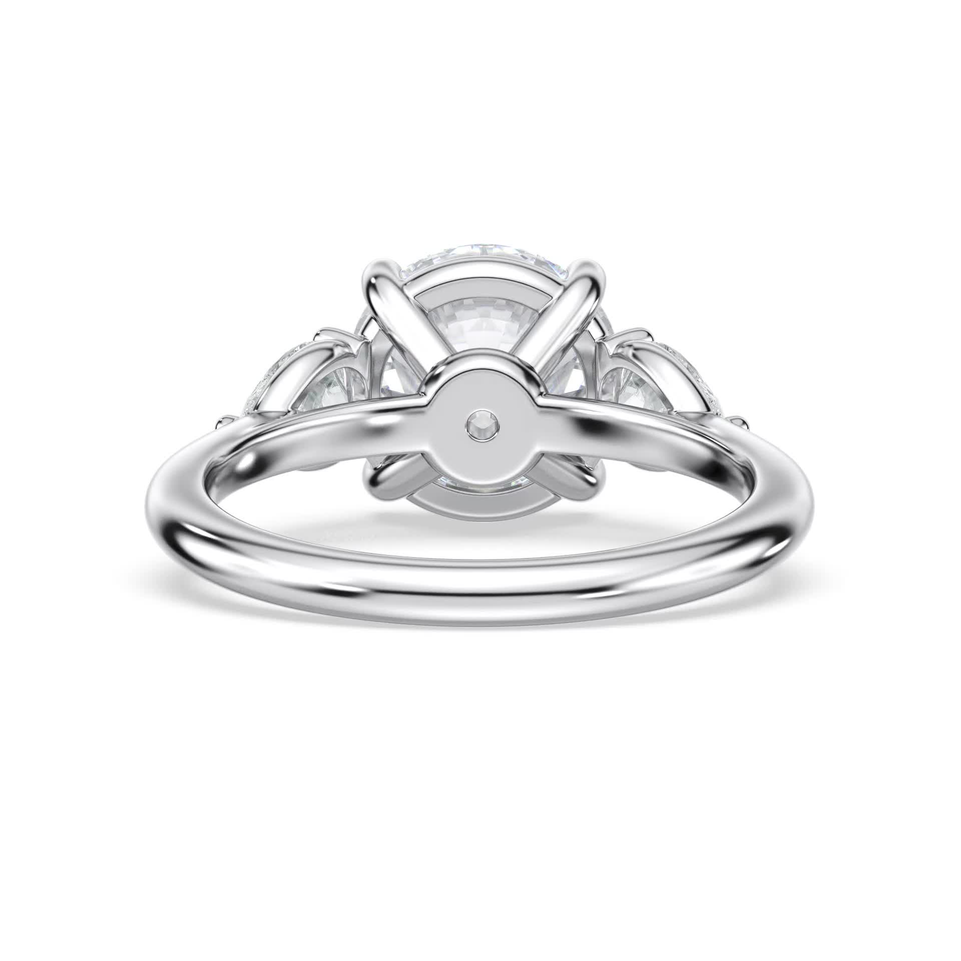 platinum naturaltapered three stone with pears engagement ring with round shape diamond