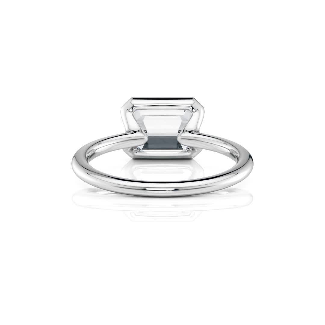 14k white gold e.w. half bezel emerald solitaire engagement ring with emerald shape diamond