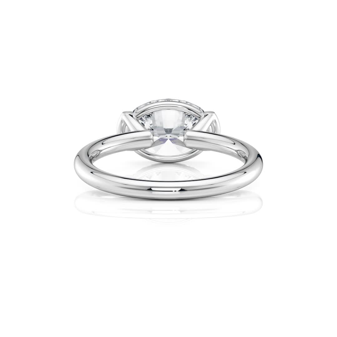 platinum east-west half bezel solitaire engagement ring with oval shape diamond