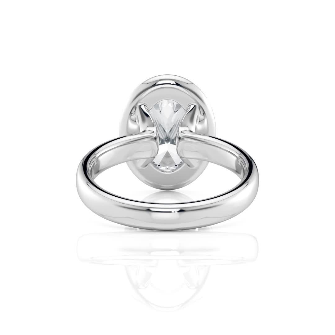 14k white gold bold hybrid bezel oval engagement ring with double claw prongs with oval shape diamond