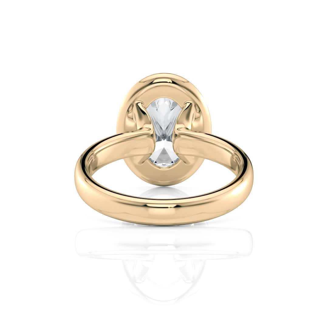14k yellow gold bold hybrid bezel oval engagement ring with double claw prongs with oval shape diamond
