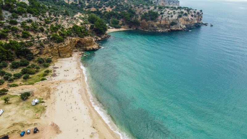 Visual journey of LIVADI BEACH: THE HIDDEN EMERALD BENEATH THE MONASTERY