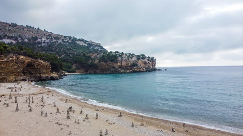 Visual journey of LIVADI BEACH: THE HIDDEN EMERALD BENEATH THE MONASTERY