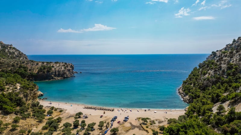 Visual journey of LIVADI BEACH: THE HIDDEN EMERALD BENEATH THE MONASTERY