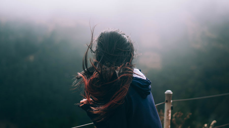 Woman struggling with hair loss and depression