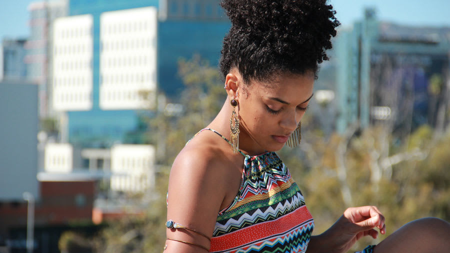 African American Lady with colorful patterned top