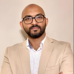 Mathew K Thomas